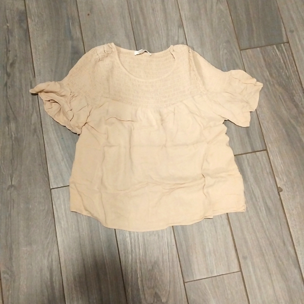 A Kirious large tan shirt
